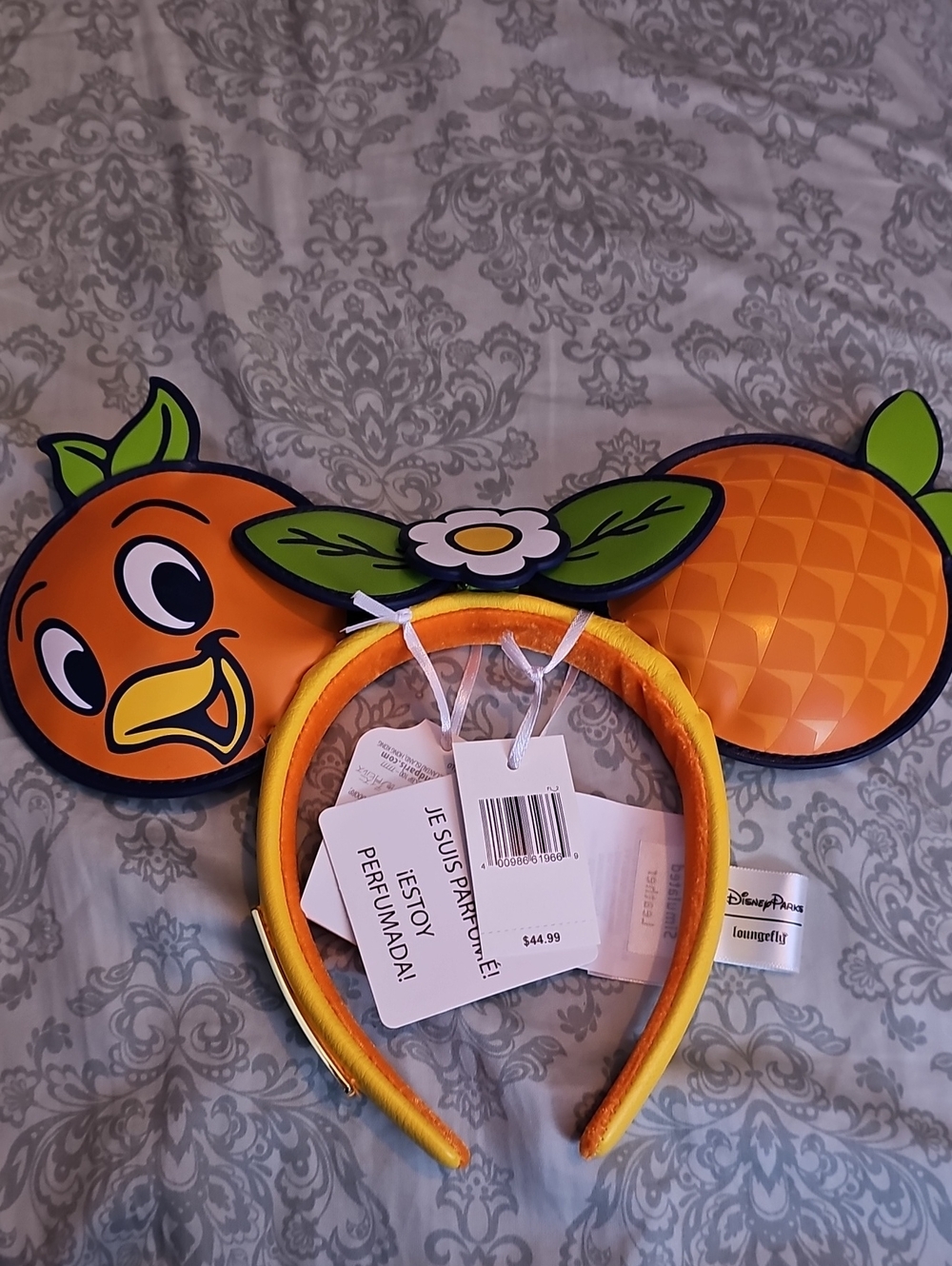 Disney Orange Bird Ear Headband with Green Leaf Accents